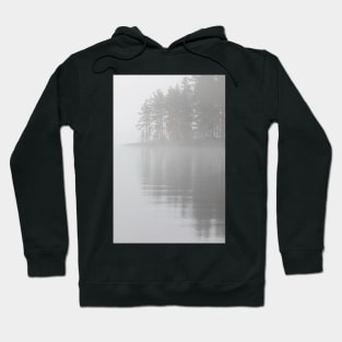 Trees reflection at lake foggy morning Hoodie